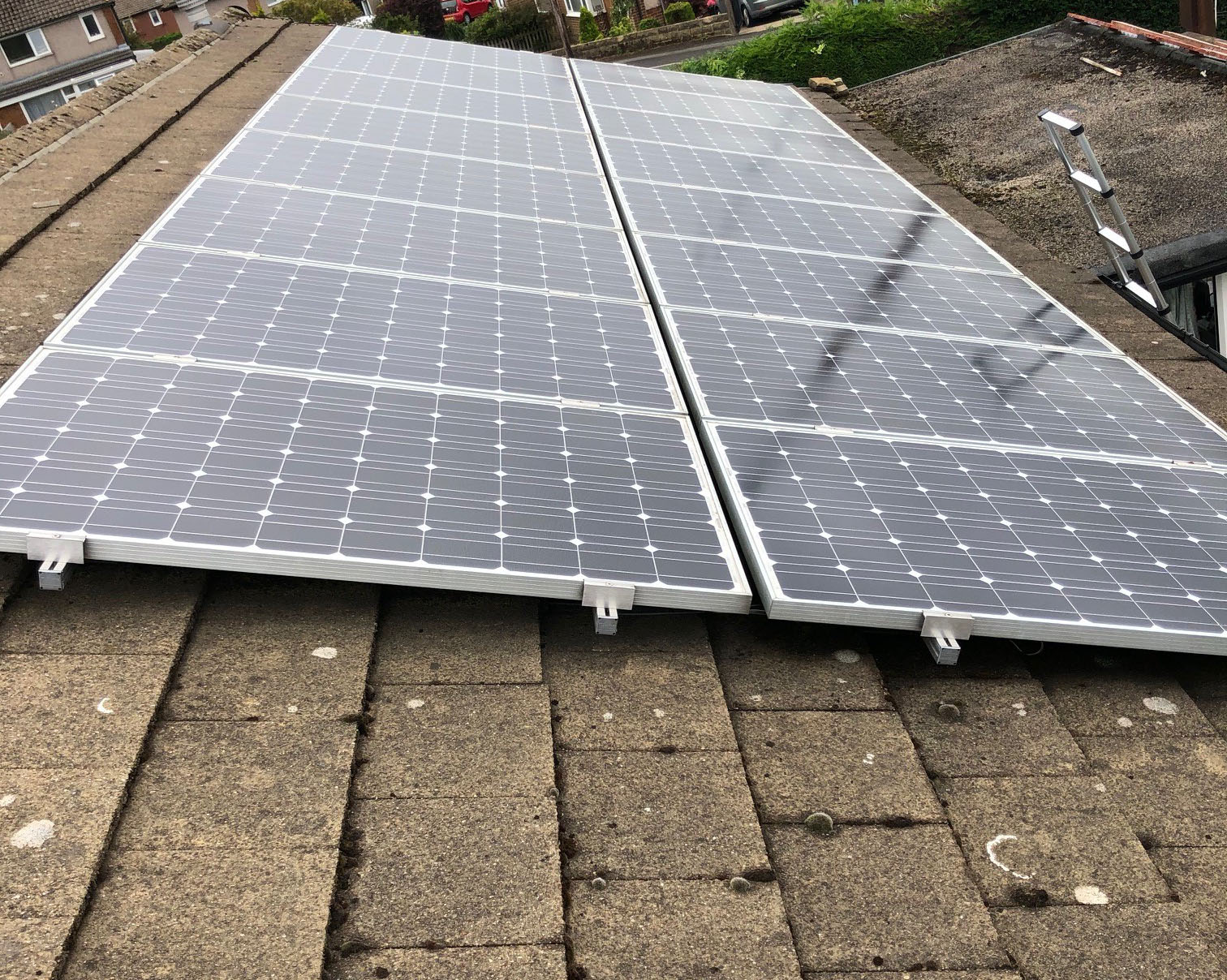 Re-roof to a Solar Panelled Roof | Green and Heritage Roofing