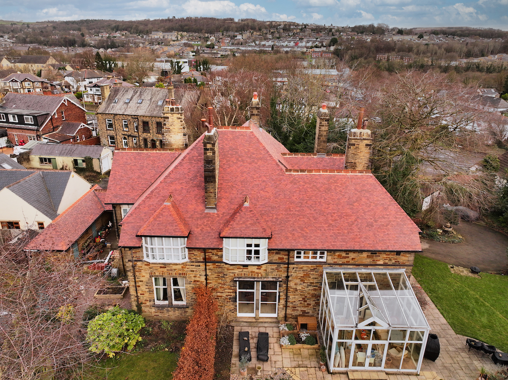 Re-roofing in Rosemary clay tiles